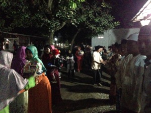 Here is the man's family coming to the woman's family bearing gifts during the Tunangan
