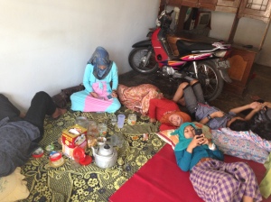 Taking a group nap at a relatives house before going to more houses!